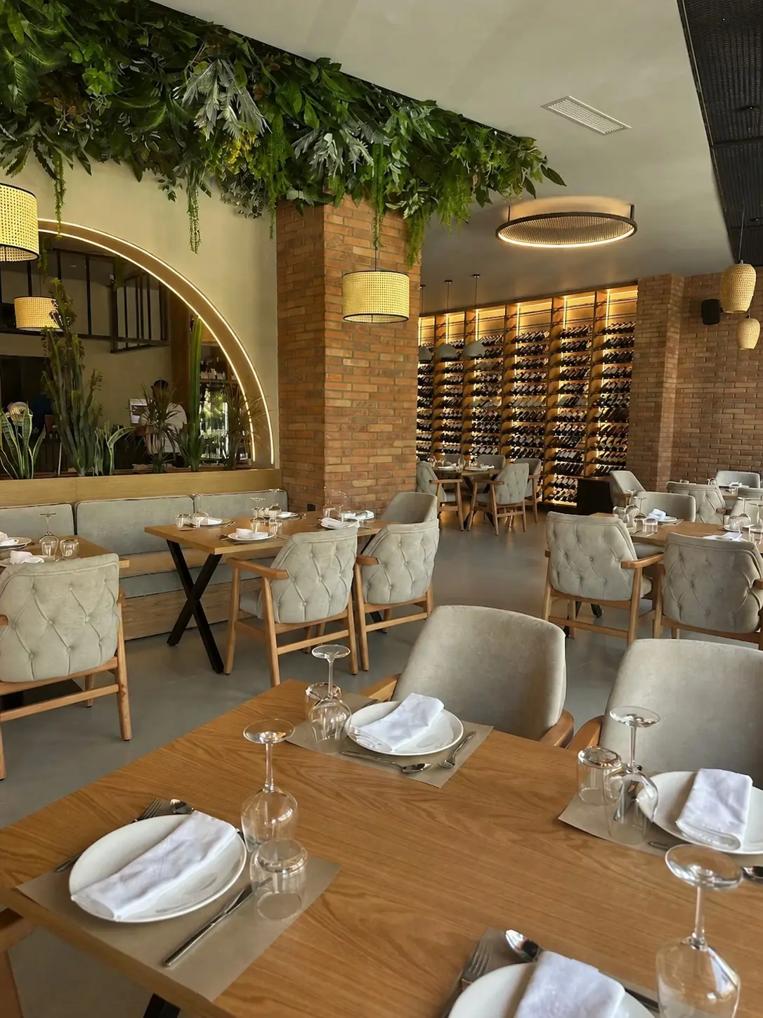 Pescato dining room with brick columns and wine display